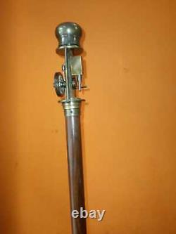 Brass walking stick with wooden
