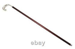 Wooden walking stick (cane) with a silver handle of 830 fineness. Sweden, 1920