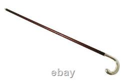 Wooden walking stick (cane) with a silver handle of 830 fineness. Sweden, 1920