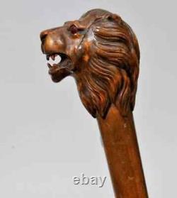 Bâton de marche en bois avec poignée en tête de lion en bois sculpté en forme d'animal