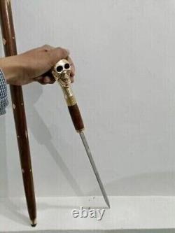 Bâton de marche en bois de style antique avec poignée de crâne