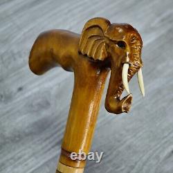 Canne bâton de marche sculpté en bois fait à la main avec un éléphant
